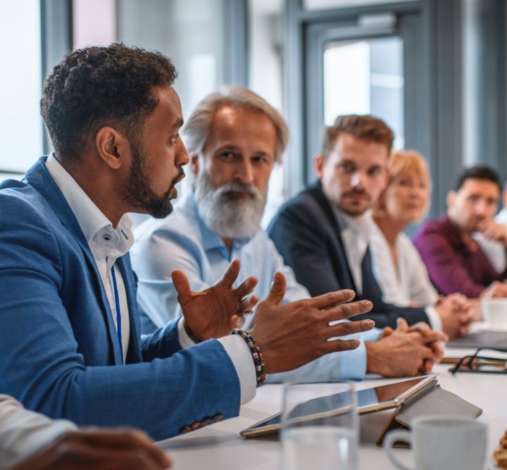 People in a meeting. 